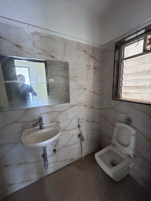 Bathroom in 2 BHK Apartment at Chirag Vijayi Jwala, Goregaon West – for Rent