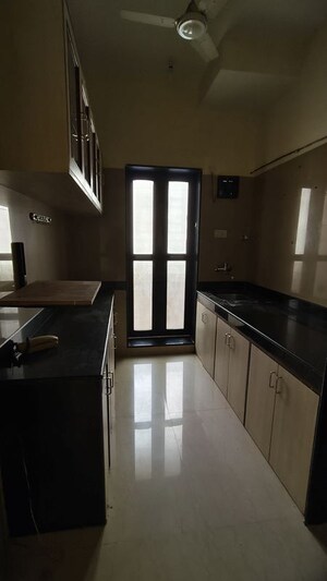 Kitchen in 1 BHK Apartment at K Raheja Raheja Residency, Malad East – for Rent
