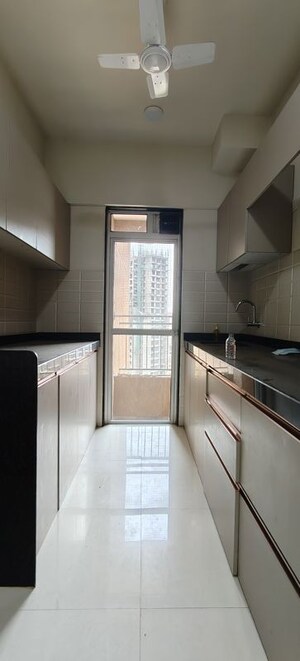 Kitchen in 2 BHK Apartment at JP North Barcelona, Mira Road – for Rent