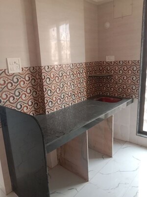 Kitchen in 1 BHK Apartment at Shree Krishna Heights Juchandra, Naigaon East – for Rent