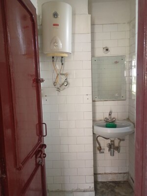 Bathroom in 3 BHK Apartment at Sector 6 Dwarka – for Rent