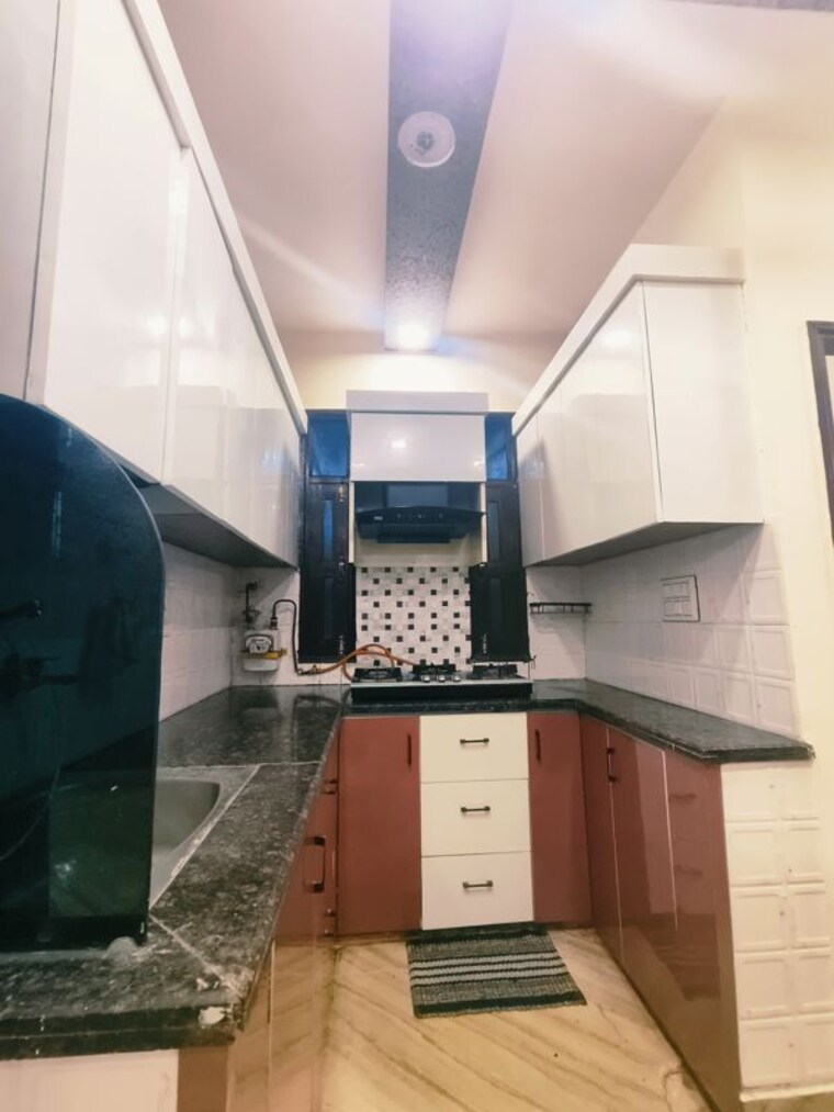 Kitchen, mansa ram park 3 Bedroom 810 Sq.Ft. Builder Floor In Mansa Ram Park Delhi 10335173