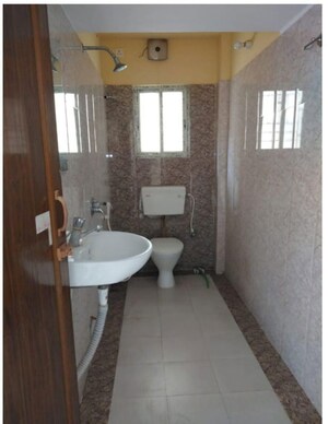 Bathroom in 3 BHK Apartment at Bengal Urban Sabujayan, Mukundapur – for Sale