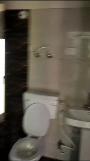 Bathroom in 1.5 BHK Apartment at Migsun Roof, Raj Nagar Extension – for Rent