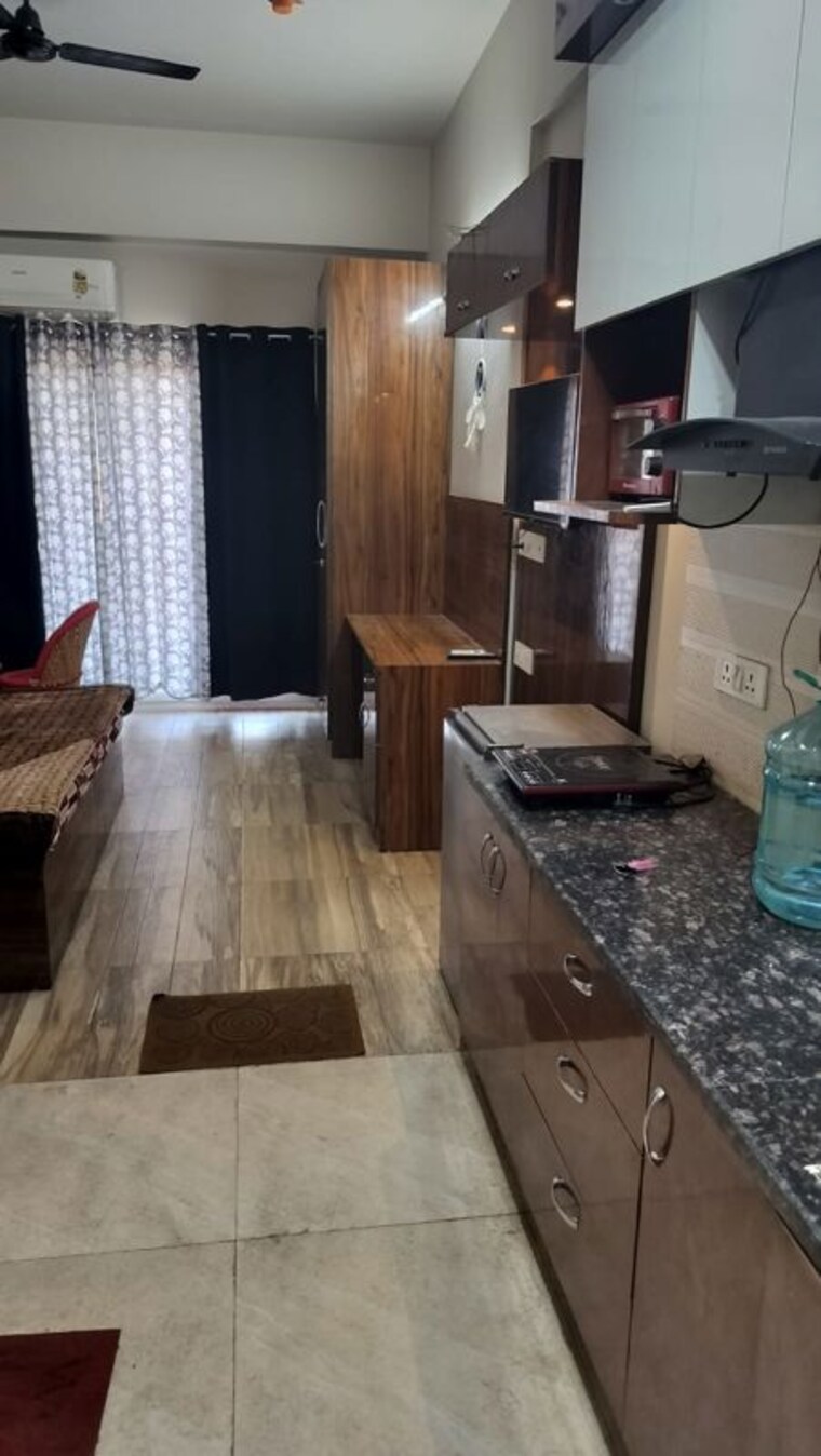 Living Room, paramount-golf-forest-studio-apartments-oak-tower 1 RK 435 Sq.Ft. Apartment In Zeta I Greater Noida Greater Noida 10335266