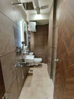 Bathroom in 4 BHK Apartment at Sarvodaya Enclave – for Rent