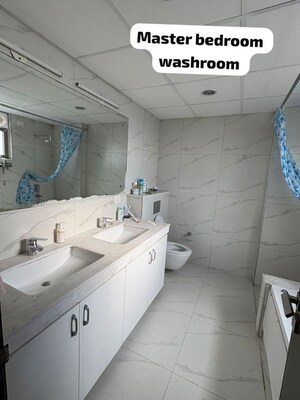 Bathroom in 4 BHK Apartment at Tata Primanti-Tower Residences, Sector 72 – for Sale