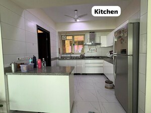 Kitchen in 4 BHK Apartment at Tata Primanti-Tower Residences, Sector 72 – for Sale