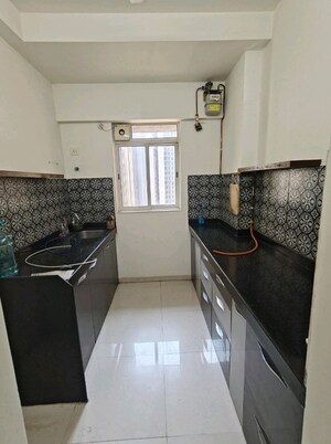 Kitchen in 2 BHK Apartment at Lodha Amara, Kolshet Road – for Rent
