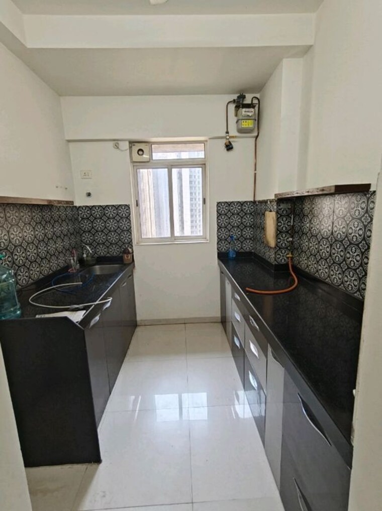 Kitchen, lodha-amara 2 Bedroom 672 Sq.Ft. Apartment In Kolshet Road Thane 10335280