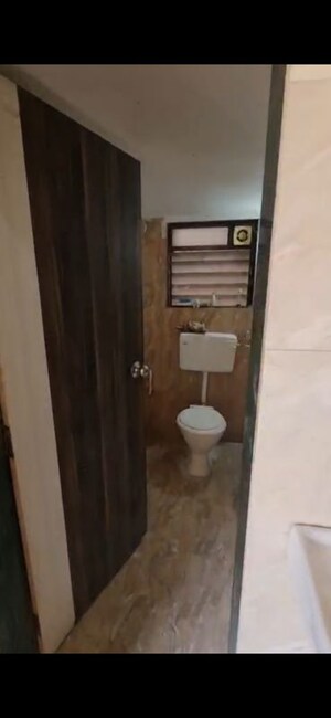 Bathroom in 2 BHK Apartment at Tulsi Dham CHS, Badlapur East – for Rent