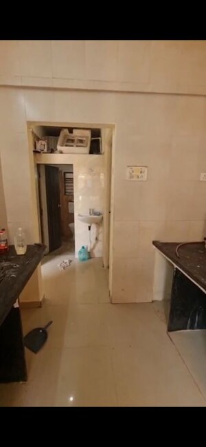 Kitchen in 2 BHK Apartment at Tulsi Dham CHS, Badlapur East – for Rent