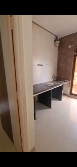 Kitchen in 2 BHK Apartment at Tulsi Dham CHS, Badlapur East – for Rent