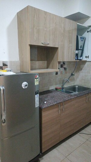 Kitchen in 2 BHK Apartment at Gaur City 2 - 14th Avenue, Sector 16c Greater Noida – for Rent