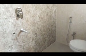 Bathroom in 1 BHK Apartment at Nav Sai Dham CHS, Thane West – for Rent