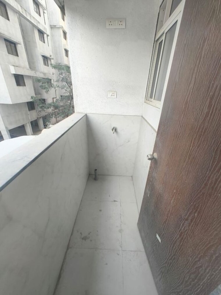 Balcony, vasant-infinia 2 Bedroom 750 Sq.Ft. Apartment In Wakad Pune 10335499