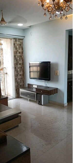 Hall in 2 BHK Apartment at The Wadhwa Palm Beach Residency, Nerul Sector 4 – for Rent