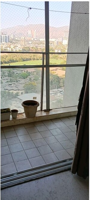 Balcony in 2 BHK Apartment at The Wadhwa Palm Beach Residency, Nerul Sector 4 – for Rent