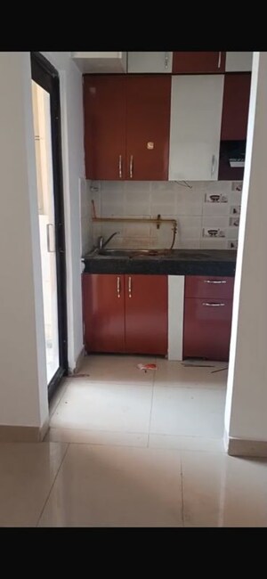 Kitchen in 2 BHK Apartment at Charms Castle Phase II, Raj Nagar Extension – for Sale