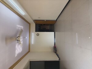 Living Room in 1 BHK Apartment at Manavsthal Heights, Andheri East – for Rent