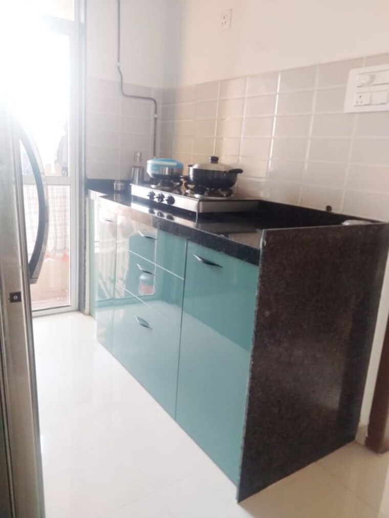 Kitchen, jp-infra-north-celeste 1 Bedroom 360 Sq.Ft. Apartment In Mira Road Thane 10335442