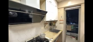 Kitchen in 3 BHK Apartment at Adani Group Western Heights, Andheri West – for Rent