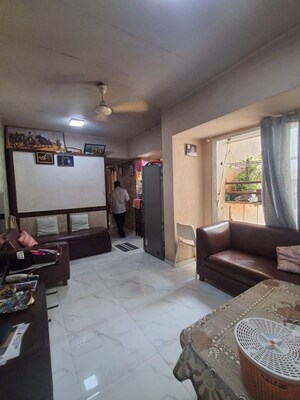 Living Room in 1.5 BHK Apartment at Vivekanand Nagar – for Sale