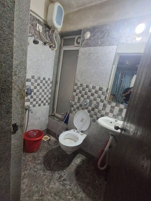 Bathroom in 1.5 BHK Apartment at Vivekanand Nagar – for Sale