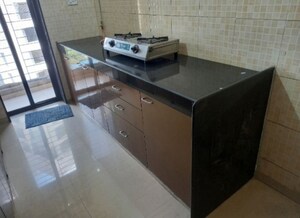 Kitchen in 2 BHK Apartment at Lalani Residency, Kavesar – for Sale