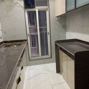 Balcony in 2 BHK Apartment at Kosmos Kedar Darshan, Kastur Park – for Rent