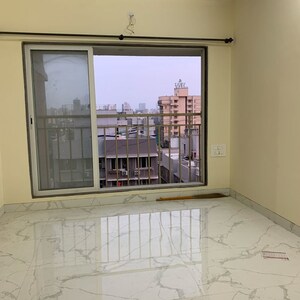 Room in 2 BHK Apartment at Kosmos Kedar Darshan, Kastur Park – for Rent