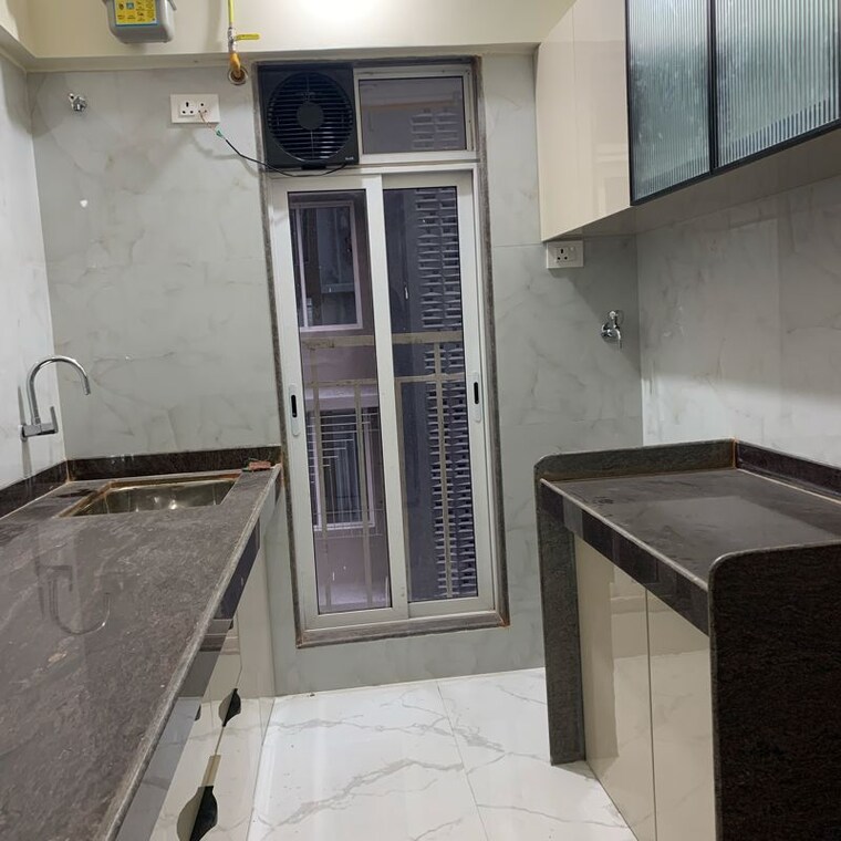 Kitchen, kosmos-kedar-darshan 2 Bedroom 630 Sq.Ft. Apartment In Kastur Park Mumbai 10335992