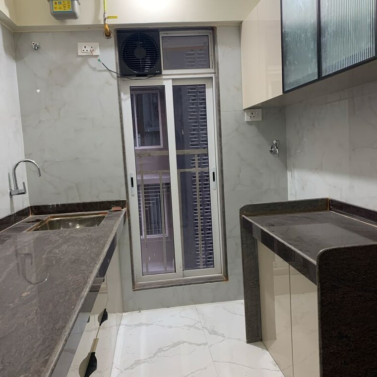 Kitchen, kosmos-kedar-darshan 2 Bedroom 630 Sq.Ft. Apartment In Kastur Park Mumbai 10335992