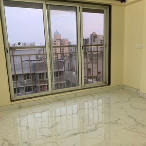 Balcony in 2 BHK Apartment at Kosmos Kedar Darshan, Kastur Park – for Rent