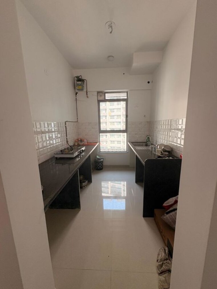 Kitchen, kalpataru-immensa-b 2 Bedroom 663 Sq.Ft. Apartment In Kolshet Road Thane 10335977