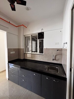 Kitchen in 2 BHK Apartment at Rohan Anand Phase 1, Somatane – for Rent