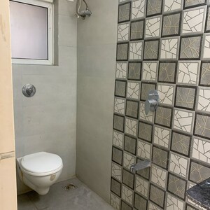 Bathroom in 1.5 BHK Apartment at Unique Abode, Kastur Park – for Rent