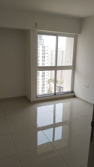 Room in 2 BHK Apartment at Godrej Emerald, Ghodbunder Road – for Rent