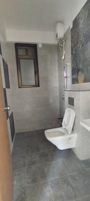 Bathroom in 2 BHK Apartment at Amann Heritage, Andheri West – for Rent