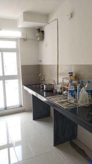 Kitchen in 3 BHK Apartment at Godrej Emerald, Ghodbunder Road – for Rent