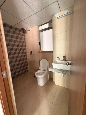 Bathroom in 3 BHK Apartment at Kalpataru Immensa B, Kolshet Road – for Rent