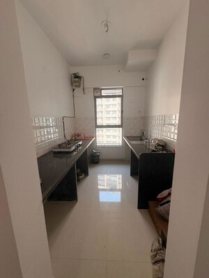 Kitchen in 3 BHK Apartment at Kalpataru Immensa B, Kolshet Road – for Rent