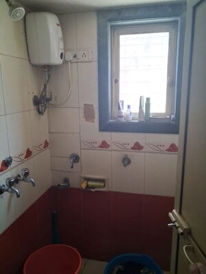 Bathroom in 1 BHK Apartment at Kandarpada – for Sale