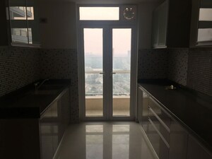 Kitchen in 3 BHK Apartment at Omkar Alta Monte, Malad East – for Rent