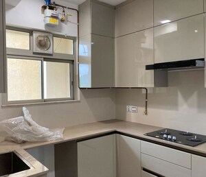Kitchen in 2.5 BHK Apartment at Velocity Hill Spring, Ghodbunder Road – for Rent