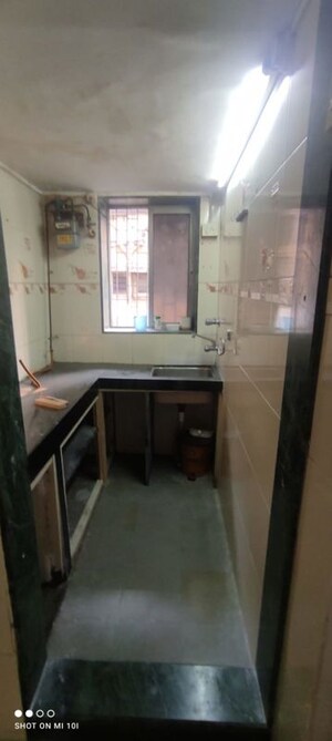 Kitchen in 1 BHK Apartment at Adarsh Nagar CHS Worli, Worli – for Rent