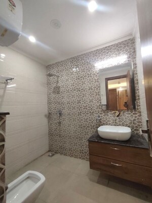 Bathroom in 3.5 BHK Builder Floor at Freedom Fighters Enclave – for Rent