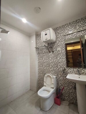 Bathroom in 3.5 BHK Builder Floor at Freedom Fighters Enclave – for Rent