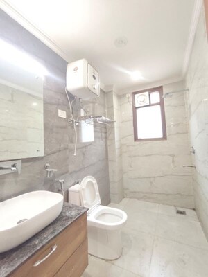 Bathroom in 3.5 BHK Builder Floor at Freedom Fighters Enclave – for Rent
