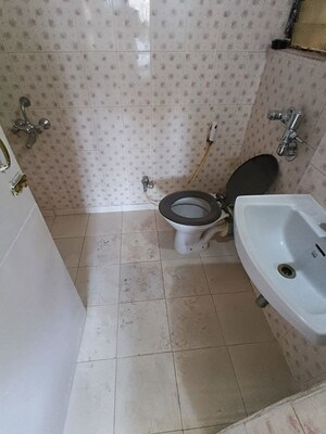 Bathroom in 2 BHK Apartment at Green Hills, Kandivali East – for Rent